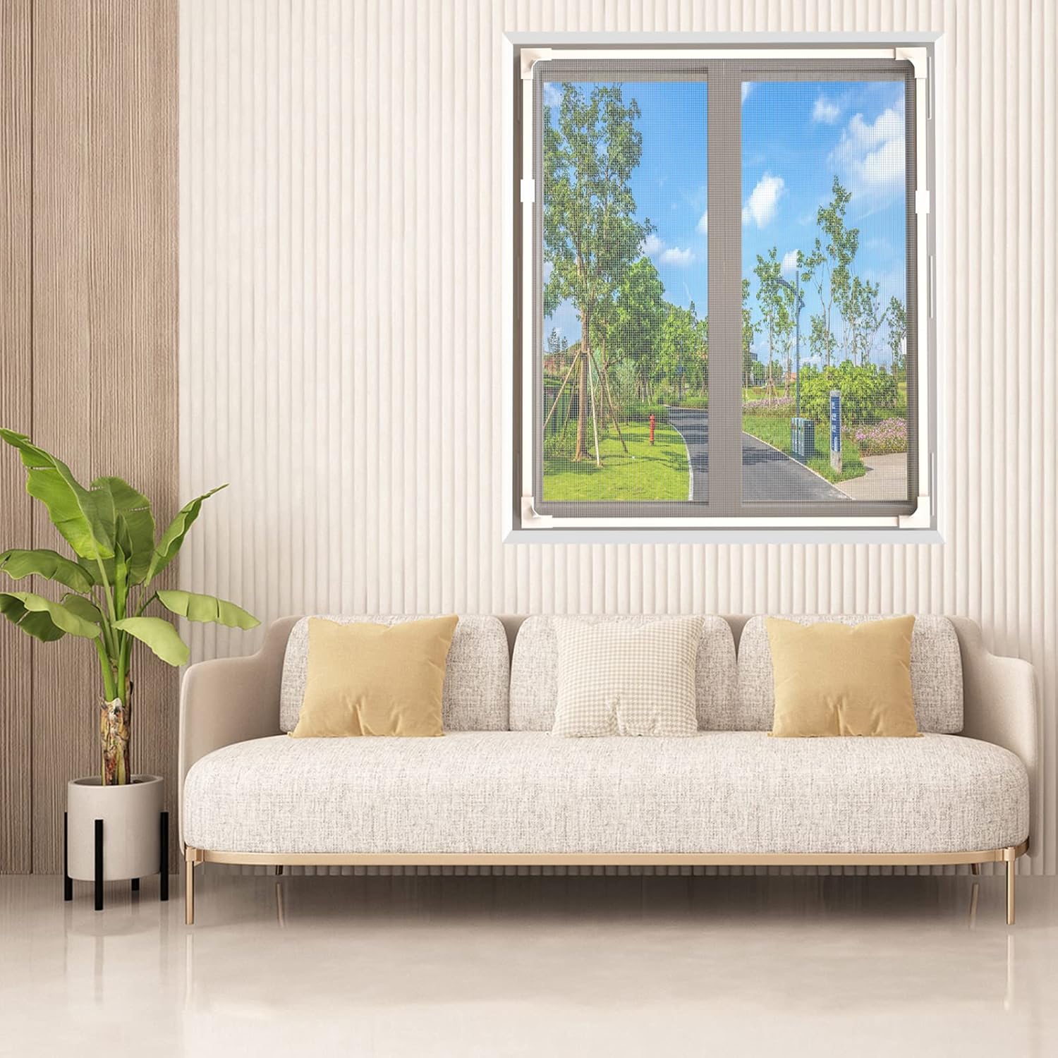 Magnetic window screen installed in a modern living room